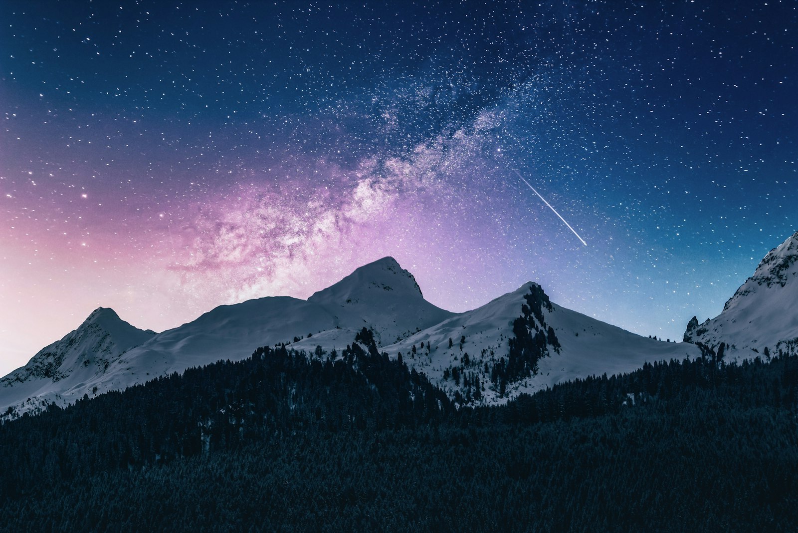 Snow-covered mountain peaks near Fraser at dusk